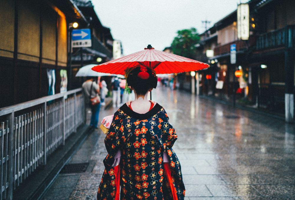 A traditionally dressed woman in 25 Japan Travel Tips