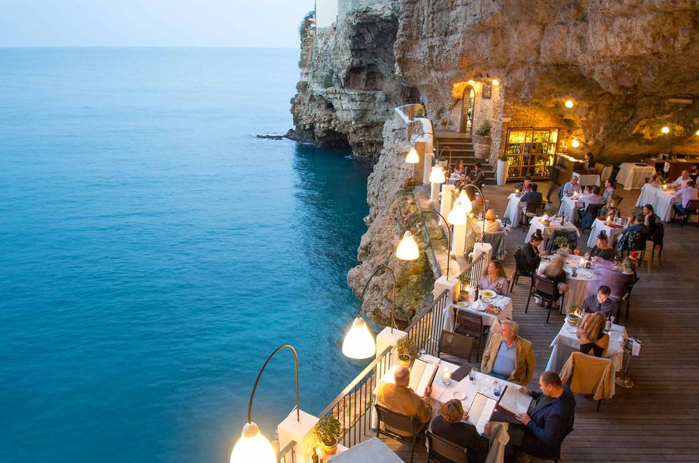 View of the Grotta Palazzese (Polignano a Mare) one of the Best Places to Eat in Puglia