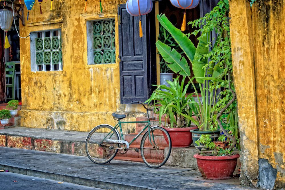 A bike and facade in Hot An in the Best Places to Visit in Vietnam