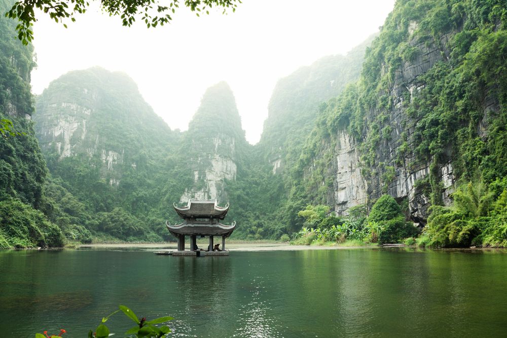 Ninh Binh lake and mountains in the best places to visit in Vietnam