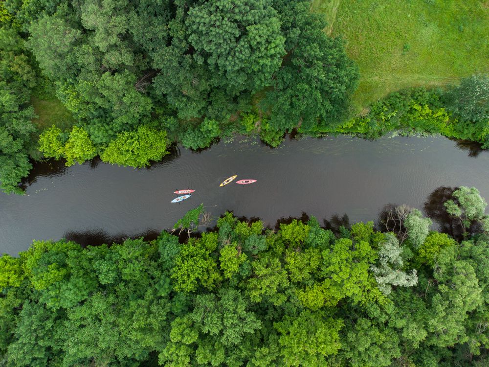 Aerial view of kayaks, representing Stippl, the best travel planning app for 2024