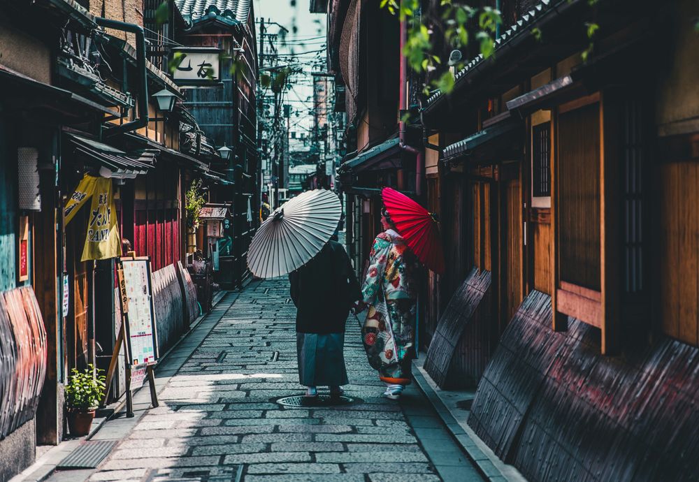 Two women in a street of Kyoto, one of the Best Spring Destinations