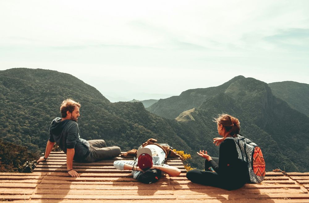 Friends on the mountains, representing the Best Group Travel App