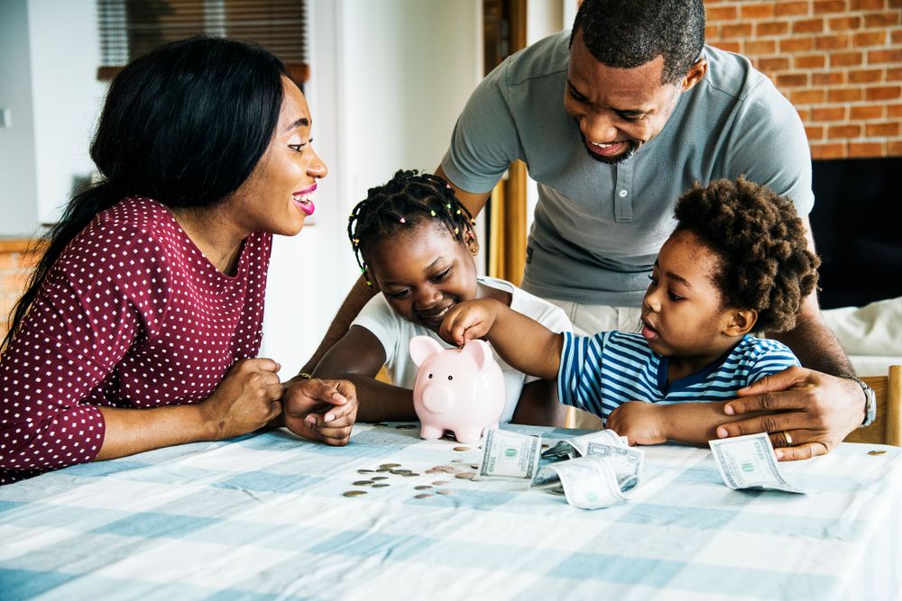 How to save money on flights, family is saving money using a piggy bank