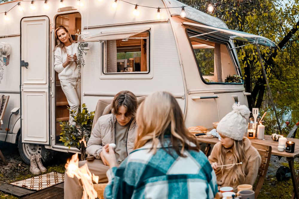 Family Travel Budget, a family on a holiday in a campervan