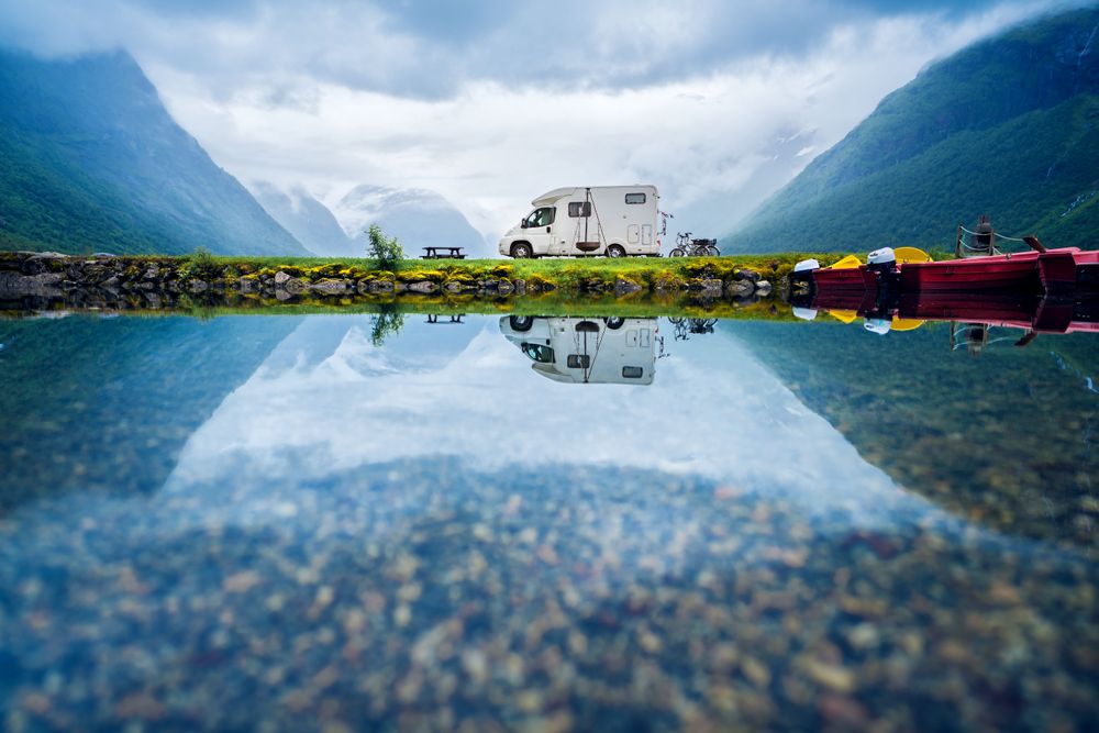A van by a lake representing a Vacation Planner App