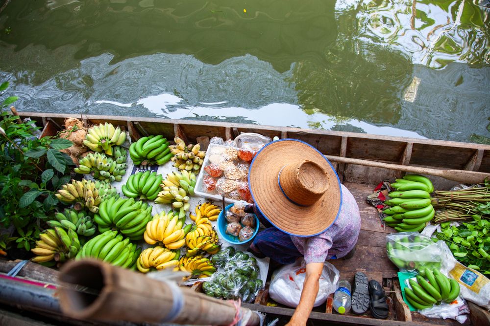  Woman selling fruit in Thailand, one of the Must-Visit Foodie Destinations in Southeast Asia
