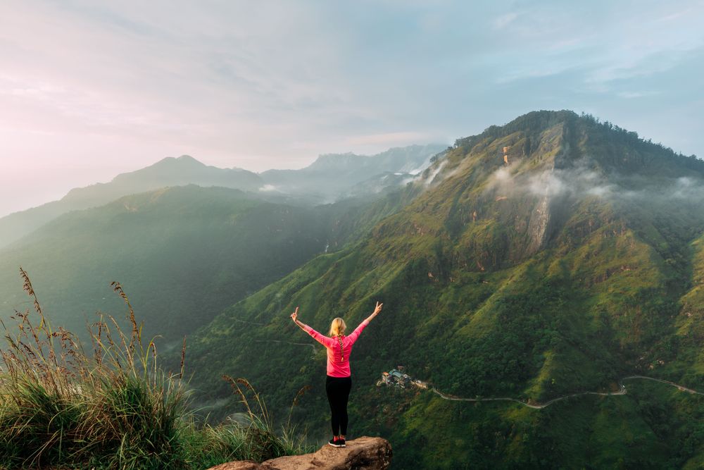 Woman in the Knuckles Mountain Range as one of the secret places in Sri Lanka