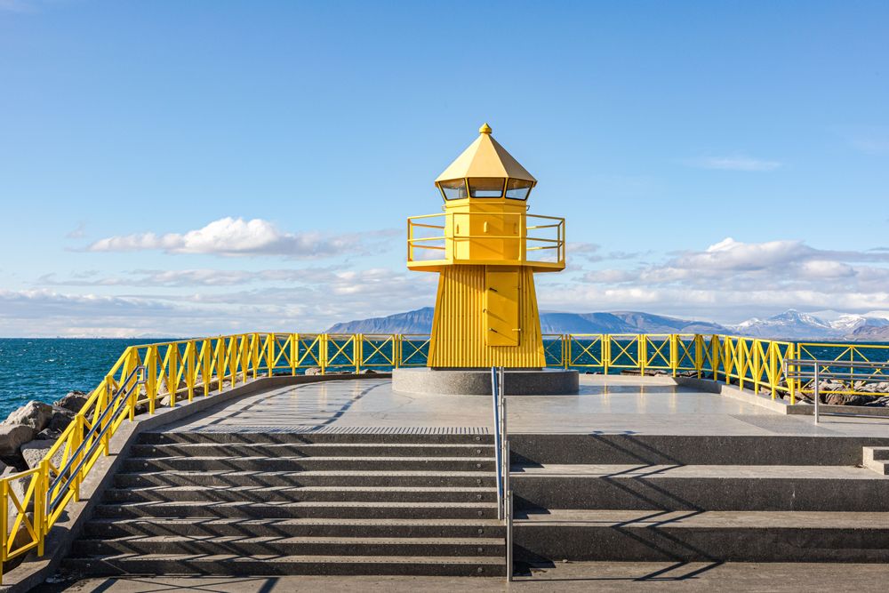 Photo of a yellow lighthouse in Reykjavik, one of the Best Destinations for Relaxation