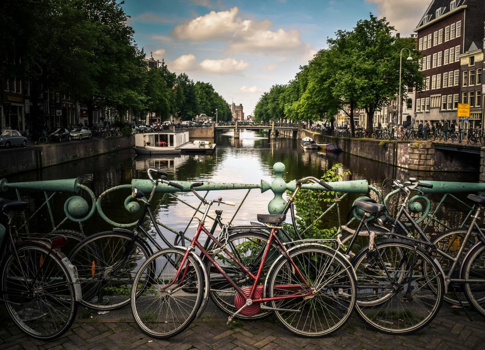 View over a canal in Amsterdam,  one of the Best Spring Destinations
