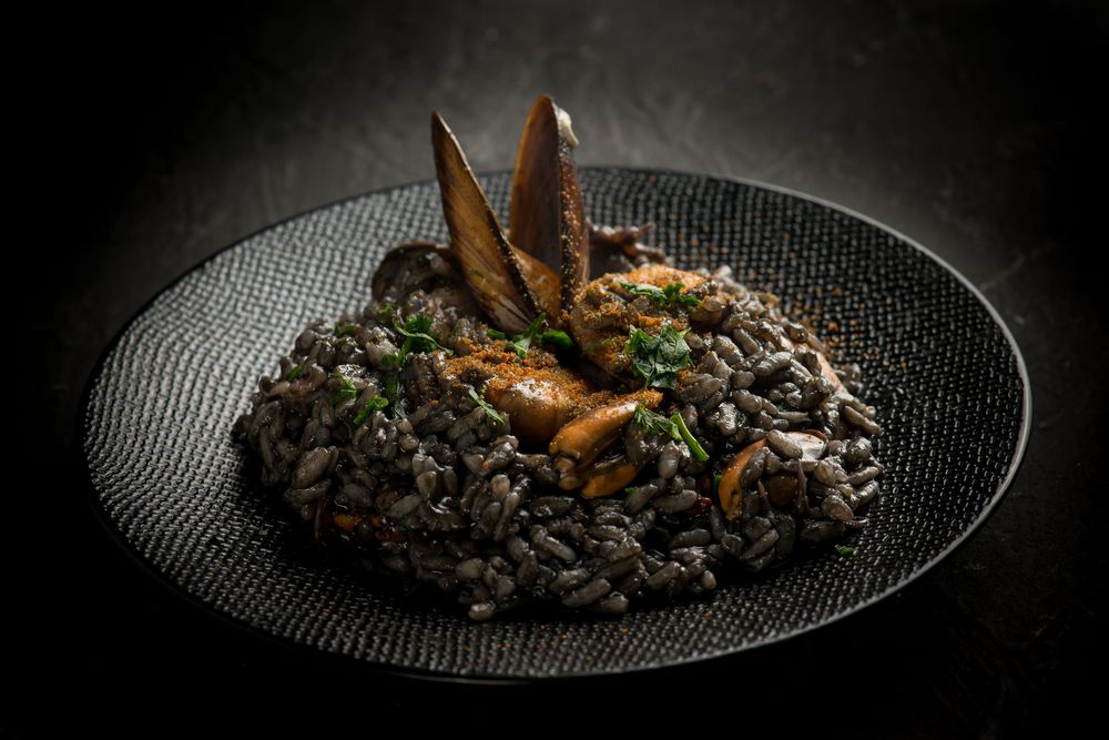 risotto al nero di seppia in the best places to eat in Puglia