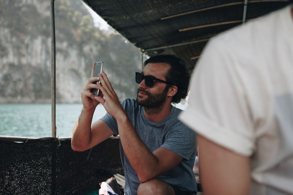 Tourist engaging in a tourist activity learning how to avoid feeling lonely while traveling solo