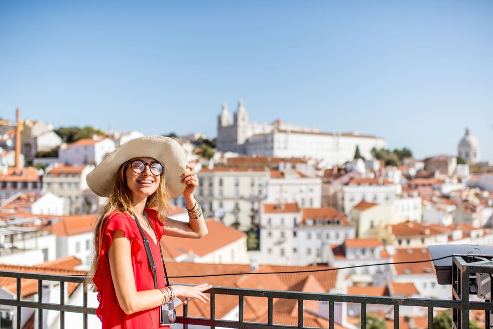 Woman in Alfama one of the Best Free Things to Do in Lisbon