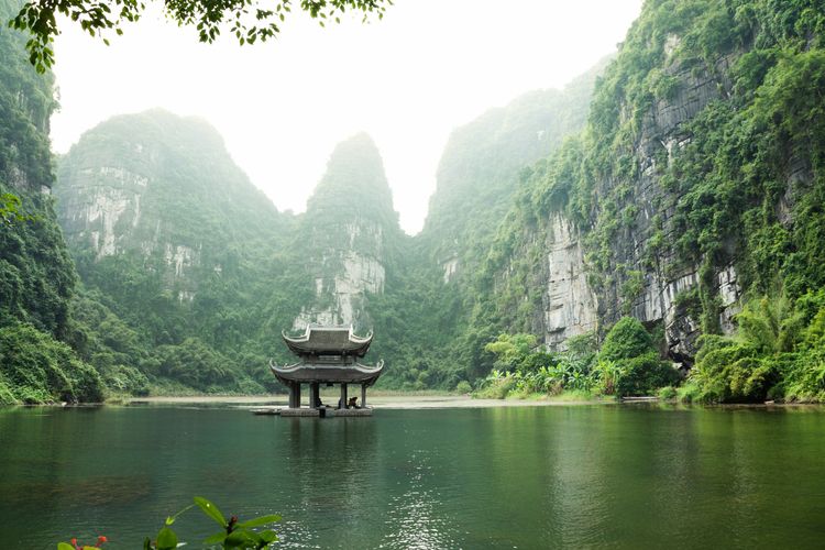 Ninh Binh lake and mountains in the best places to visit in Vietnam